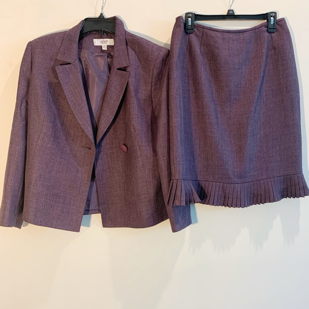 A Lesuit 2piece skirt suit in dark purple with black tweed lines in a 12 Petite.
